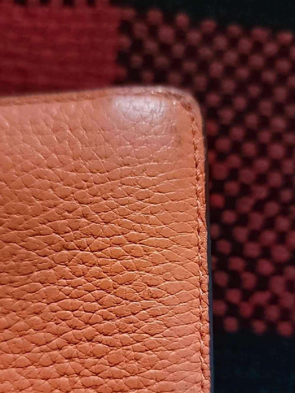 kate spade coral orange pebble leather zip-around wallet
